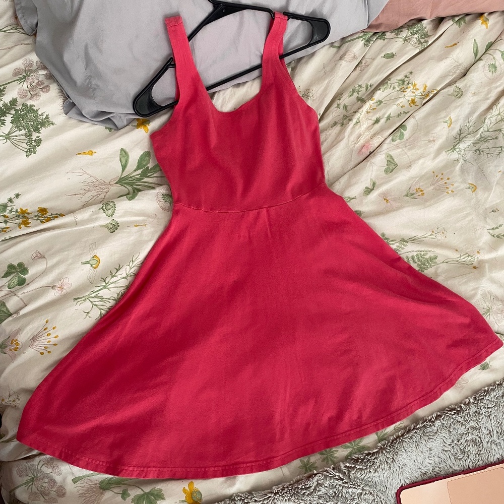Pink sleeveless skater dress